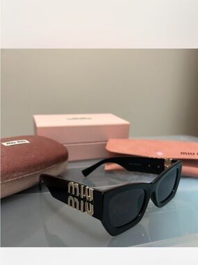 Miu Miu Black Cat-Eye Sunglasses with Gold Logo Temples